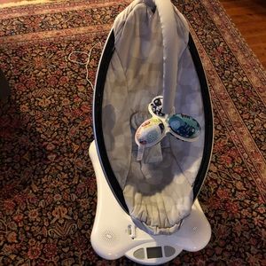 Plug in rocking chair. Moves with settings